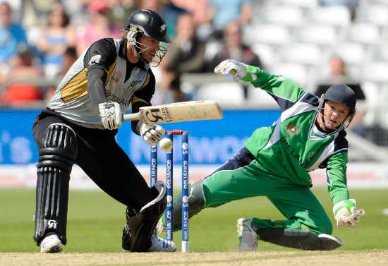 Ireland's Niall O'Brien makes a vain attempt to take an edge off Jacob Oram's bat.