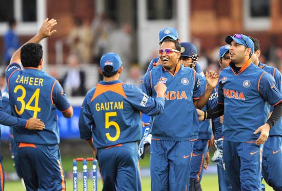 Indian players celebrate after dismissing Chris Gayle