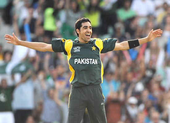 Umar Gul celebrates the wicket of Kyle Mills