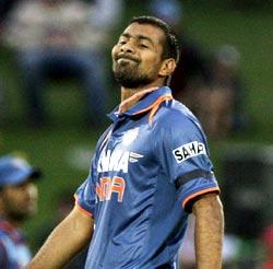 Praveen Kumar sports a black armband