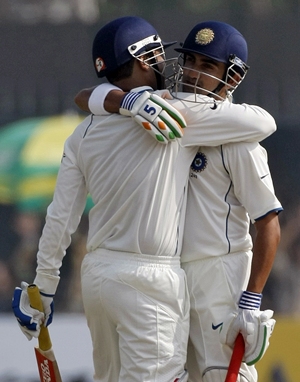 Gambhir gets a hug from Sehwag after scoring a century