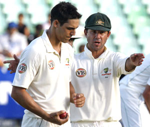 Mitchell Johnson (left) with Ricky Ponting