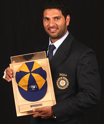 Yuvraj Singh poses with his cap as a member of The ODI Team of the Year