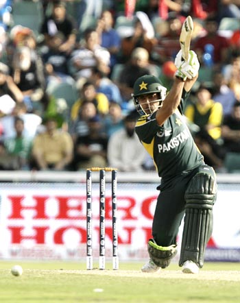 Umar Akmal drives the ball during his innings of 55