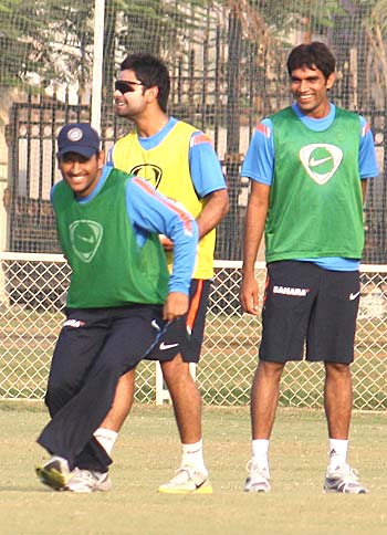 Mahendra Singh Dhoni (left) with team-mates