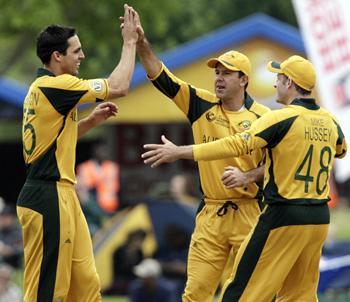 Aussies celebrate in the field