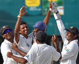 Randiv is congratulated by his teammates