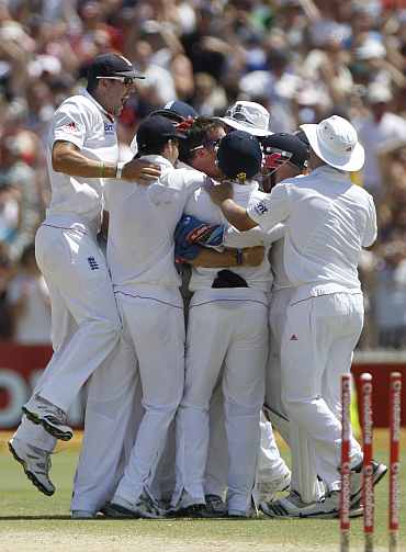 England players celebrate after winning the second Ashes Test in Adelaide
