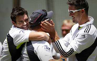 England's James Anderson and Kevin Pietersen joke around during a practice session ahead of the third Ashes Test in Perth