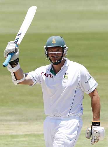 Graeme Smith celebrates after scoring a half-century during the first Test against India at Centurion