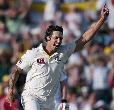 Australia's Mitchell Johnson celebrates after picking up a wicket against England during the third Ashes Test in Perth