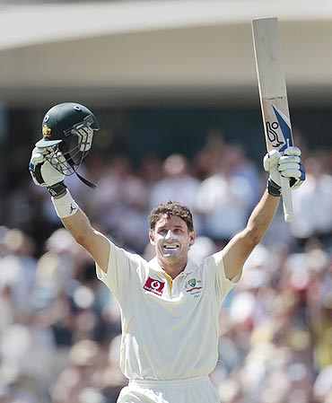 Mike Hussey reacts after making a century