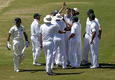 South African players celebrate after winning the Test against India in Centurion