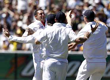 England's Tim Bresnan celebrates after picking up an Australian wicket during the fourth Ashes Test in Melbourne