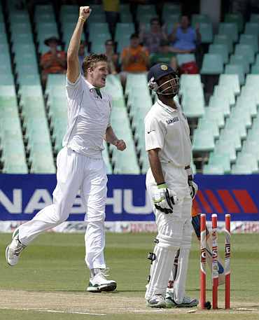 South Africa's Morne Morkel celebrates after dismissing India's Cheteshwar Pujara during a second Test