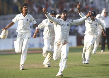 Harbhajan Singh celebrates after taking Morkel's wicket