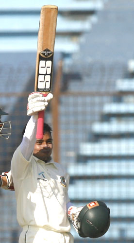 Mushfiqur Rahim acknowledges the crowd after scoring his maiden Test century