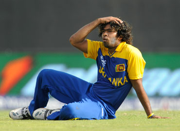 Lasith Malinga reacts after missing a chance