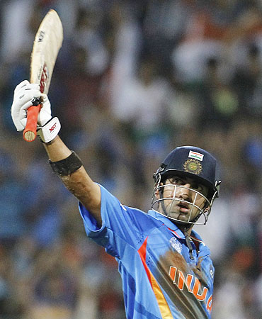 Gautam Gambhir acknowledges the crowd after scoring his half century