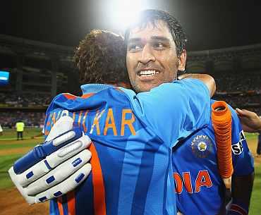 MS Dhoni celebrates after winning the World Cup match