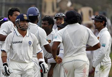 Sri Lanka players celebrate after Murali dismisses Tendulkar