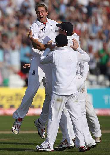 Stuart Broad celebrates after completing his hat-trick on Day 2