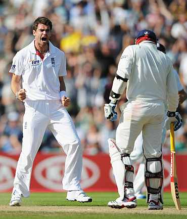 James Anderson celebrates after picking up the wicket of Virender Sehwag