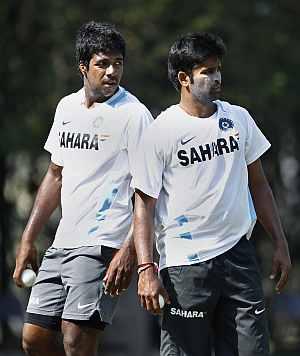 Varun Aaron (left) with R Vinay Kumar