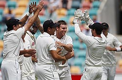 New Zealand players celebrate after defeating Australia on Monday