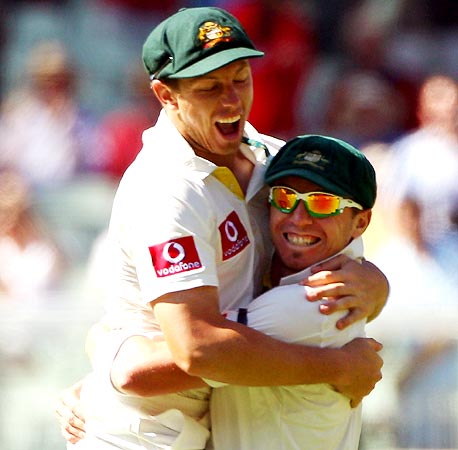 James Pattinson, left, celebrates with Peter Siddle after winning the first Test