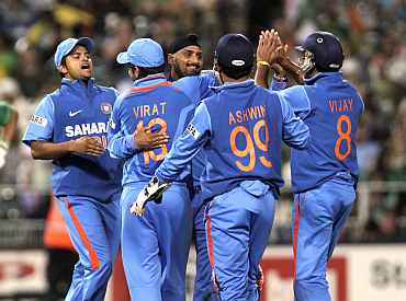 Indian players celebrate after winning a match