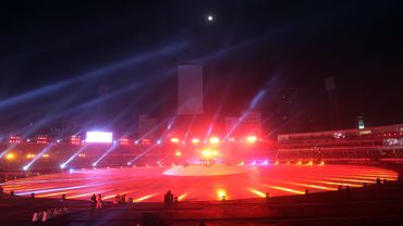 The Bangabandhu National Stadium is illuminated by laser during opening ceremony