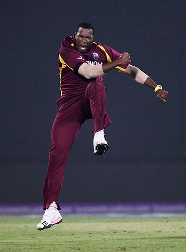 Kieron Pollard of West Indies celebrates the wicket of Graeme Smith
