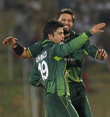 Shahid Afridi celebrates after picking up a wicket