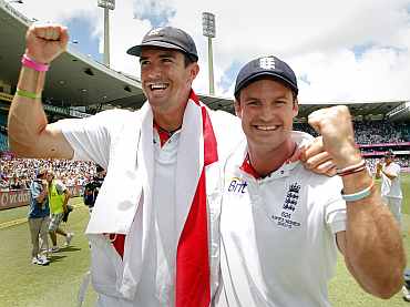England's Kevin Pietersen and Andrew Strauss celebrate after winning the Ashes against Australia at Sydney