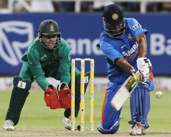 MS Dhoni plays a shot during the third One-dayer against India and South Africa at Newlands