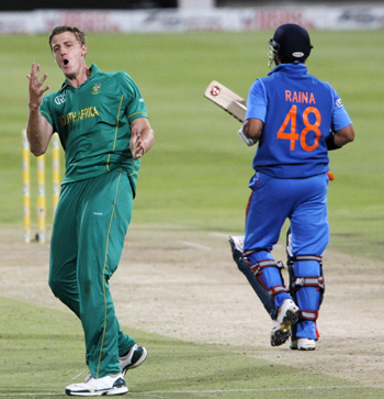 Morne Morkel celebrates after picking up Suresh Raina during the thrid One-dayer at Newlands