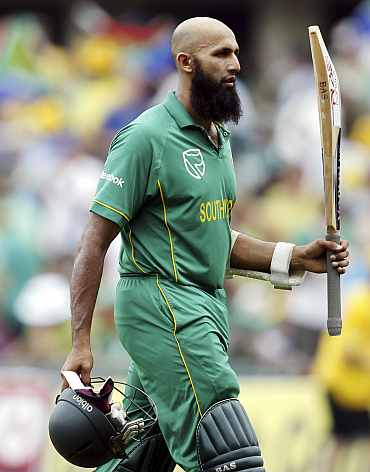Hashim Amla celebrates after hitting a century in the fifth and final One-dayer against India