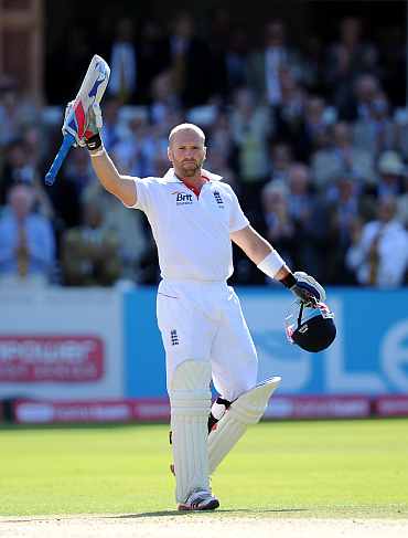 Matt Prior reacts after reaching his century against India