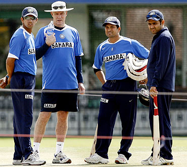 Then India coach Greg Chappell with players Rahul Dravid (left) Sachin Tendulkar (2nd from right) and Virender Sehwag (right)
