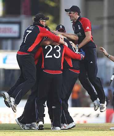 England's players celebrate after beating South Africa