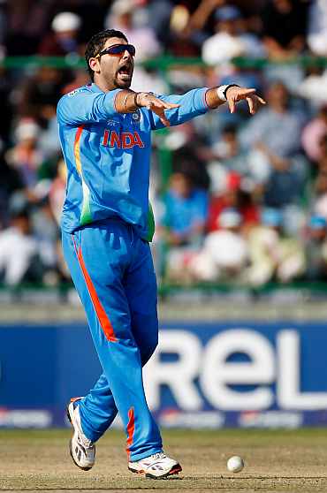 Yuvraj Singh celebrates after picking up the wicket of Wesley Barresi