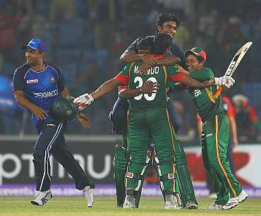Bangladesh players celebrate after winning their match against England in Chittagong