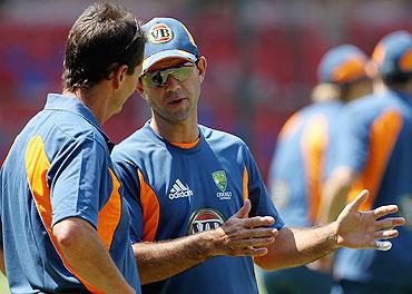 Ricky Ponting (right) speaks with chairman of selectors Andrew Hilditch during a nets session