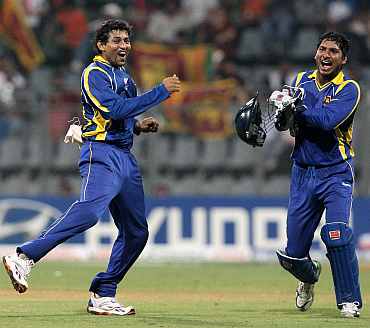 Tillakratne Dilshan celebrates after picking a wicket