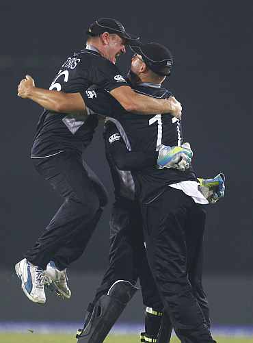 New Zealand players celebrate after winning their quarter-final match against South Africa in Mirpur