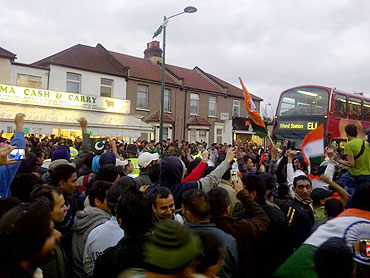 Indian fans in East London celebrate the semi-final victory on Wednesday