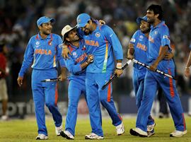 Indian players celebrate after beating Pakistan in the semi-final