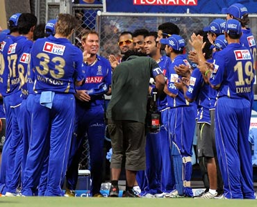 Shane Warne is cheered by his Rajasthan Royals team-mates