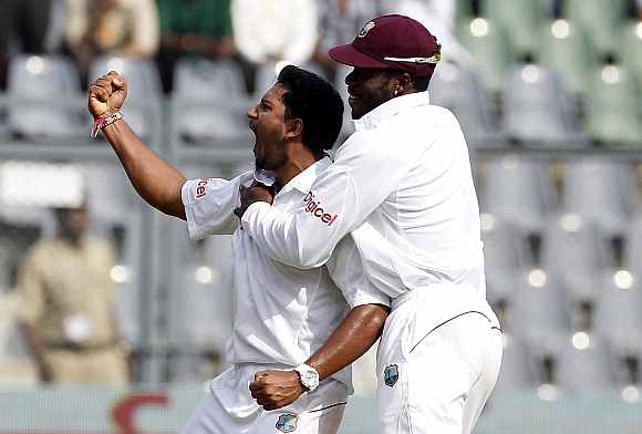 Ravi Rampaul celebrates after picking up Sachin Tendulka's wicket